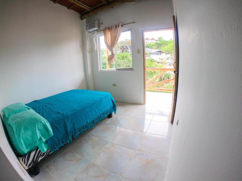 Iguana Beach House Hostel Montañita Buitenkant foto